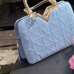 Structured Light Blue Quilted Top-Handle Satchel with Gold Hardware